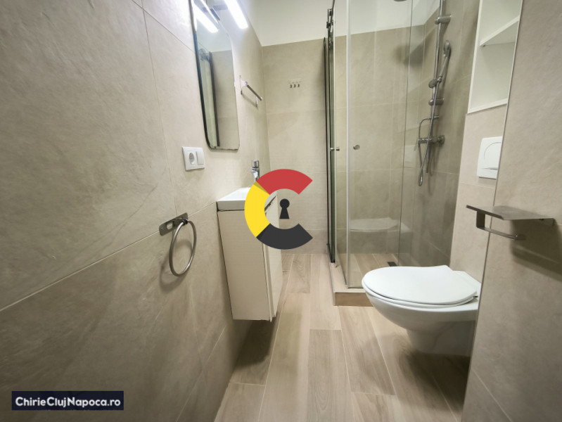 Ap. modern cu 2 dormitoare+living, 2 bai, Garaj. Gheorgheni. Bloc nou.